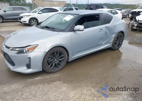 2014 Scion Tc 10 Series/Monogram z USA, uszkodzony, nr VIN JTKJF5C71E3072185